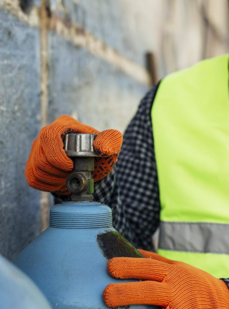 front-view-worker-with-protective-mask-gloves
